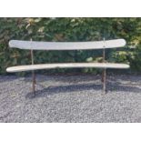 Rare pair of cast iron and painted wood curved garden benches with tree branch design. {87 cm H x