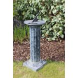 Aluminium sundial on reeded column. {92 cm H x 33 cm Dia.}