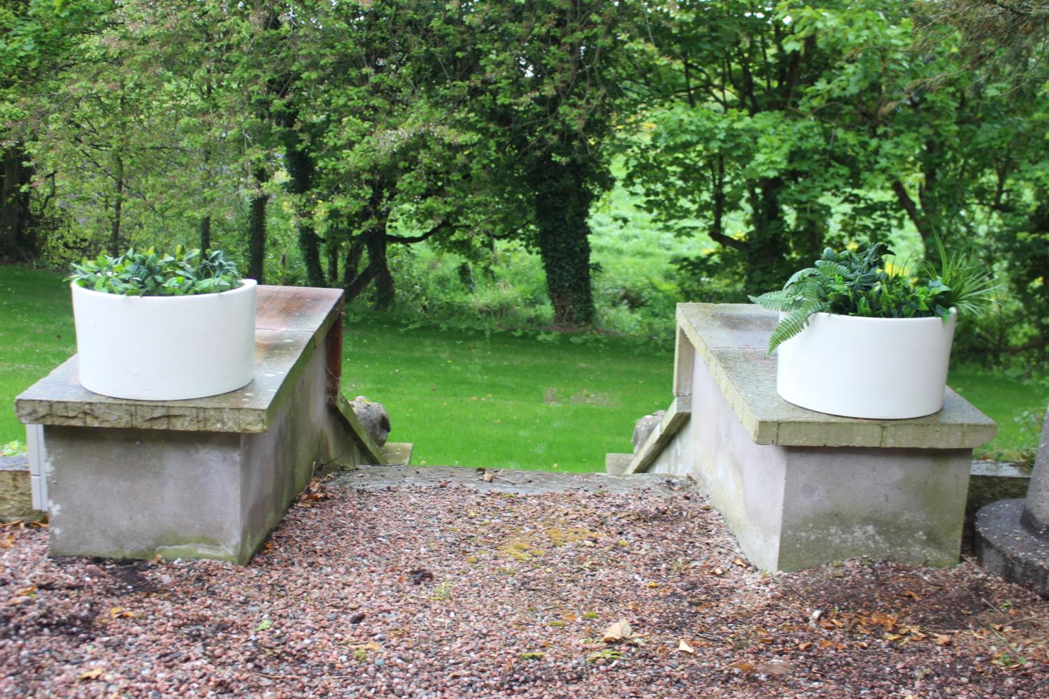 Pair of ceramic demi lune planters. {25 cm H x 44 cm W x 32 cm D}