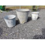 Three galvanised planters {50 cm H x 62 cm Dia., 34 cm H x 50 cm Dia. and 34 cm H x 45 cm Dia.}.