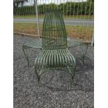 Wrought iron three seater garden bench. {103 cm H x 110 cm Dia}.