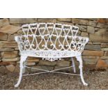 Cast aluminium two seater garden bench. {79 cm H x 93 cm W X 41 cm D}.