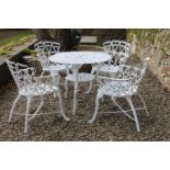 Cast aluminium garden table and four matching armchairs. Table {65 cm H x 80 cm Dia} and Chairs {