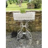 Metal plant stand with liner {95 cm H x 67 cm W x 30 cm D}.