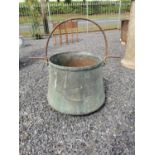 Copper planter with metal handle {75 cm H x 55 cm Dia.}.