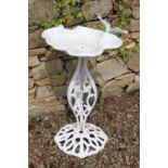 Cast aluminium bird bath with bird perched on side. {80 cm H x 55 cm Dia}.