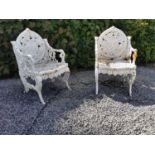 Pair of decorative cast iron garden chairs {95 cm H x 60 cm W x 50 cm D}.