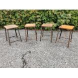 Four metal industrial garden stools. {55 cm H x 35 cm W x 35 cm D}.