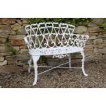 Cast aluminium two seater garden bench. {79 cm H x 93 cm W X 41 cm D}.