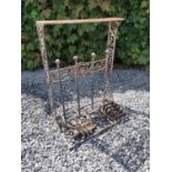 Cast iron boot stand and foot scrapper {70 cm H x 54 cm W x 32 cm D}.