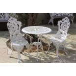 Cast aluminium garden table and two chairs. Table {89 cm H x 69 cm Dia.} and Chairs {94 cm H x 39 cm