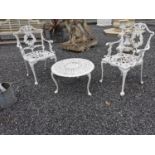 Decorative cast alloy garden table with two matching chairs. Table {35 cm H x 64 cm Dia} and