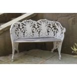 Three seater aluminium and wood garden bench with fern leaf decoration {84 cm H x 153 cm W X 32 cm