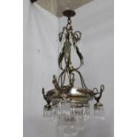 Brass and crystal glass four branch chandelier with floral decoration. {100 cm H x 50 cm Diam}.