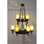 Wrought iron two tier nine branch chandelier with alabaster shades {97 cm H x 75 cm Dia.}.