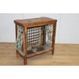 Unusual wooden and wrought iron radiator consul { 82cm H X 80cm W X 44cm D }.