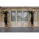 Pair of stone statues of Ladies holding five lamps mounted on marble bases. {220 cm H x 119 cm W x