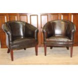 Pair of dark brown leather upholstered tub chairs {78 cm H x 70 cm W x 47 cm D}.
