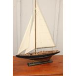 Model of a sailing yacht {98 cm H x 75 cm W x 13 cm D}.