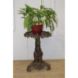 Decorative cast iron jardinière stand {68 cm H x 52 cm Dia.}.