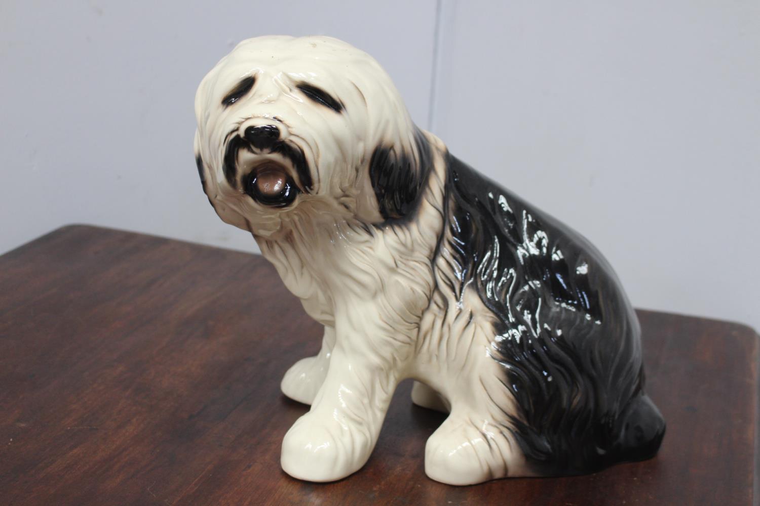 Ceramic model of Old English Sheepdog. {35 cm H x 40 cm W x 20 cm D}