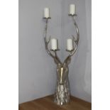 White metal four branch candle holder in the form of a Stag's head. { 114cm H X 50cm W X 50cm D }.