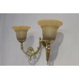 Double brass wall light with amber shades {30 cm H x 47 cm W x 20 cm D}.