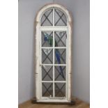 Leaded glass window frame with parrot decoration in glass {170 cm H x 62 cm W x 8 cm D}.