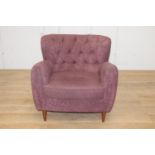 Deep buttoned upholstered tub chair {85 cm H x 85 cm W x 58 cm D}.