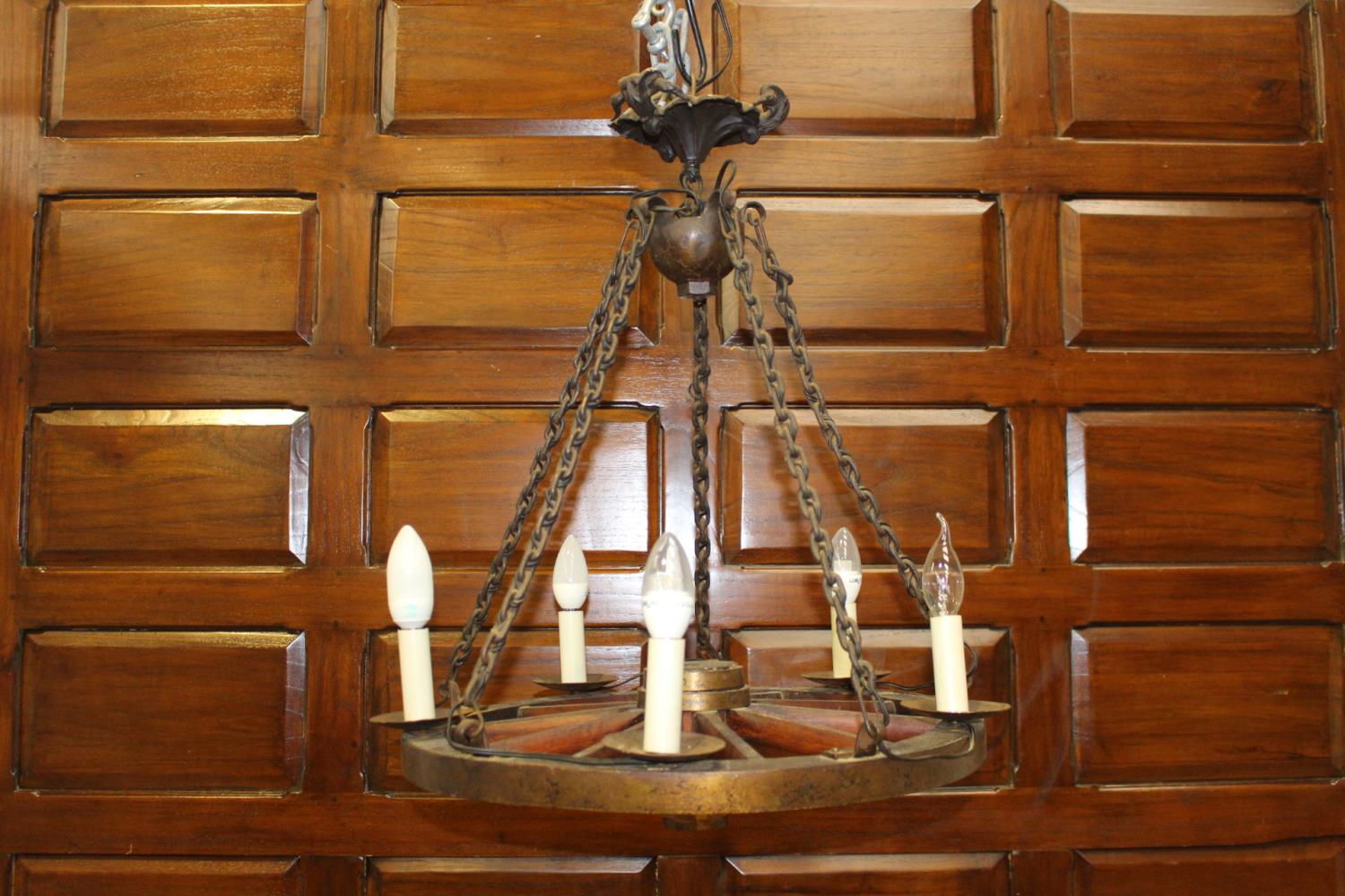 Brass and wooden five light wagon wheel hanging light {65 cm H x 52 cm Dia.}.