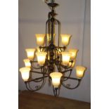 Wrought iron fifteen branch chandelier with opaque shades {140 cm H x 114 cm Dia.}.