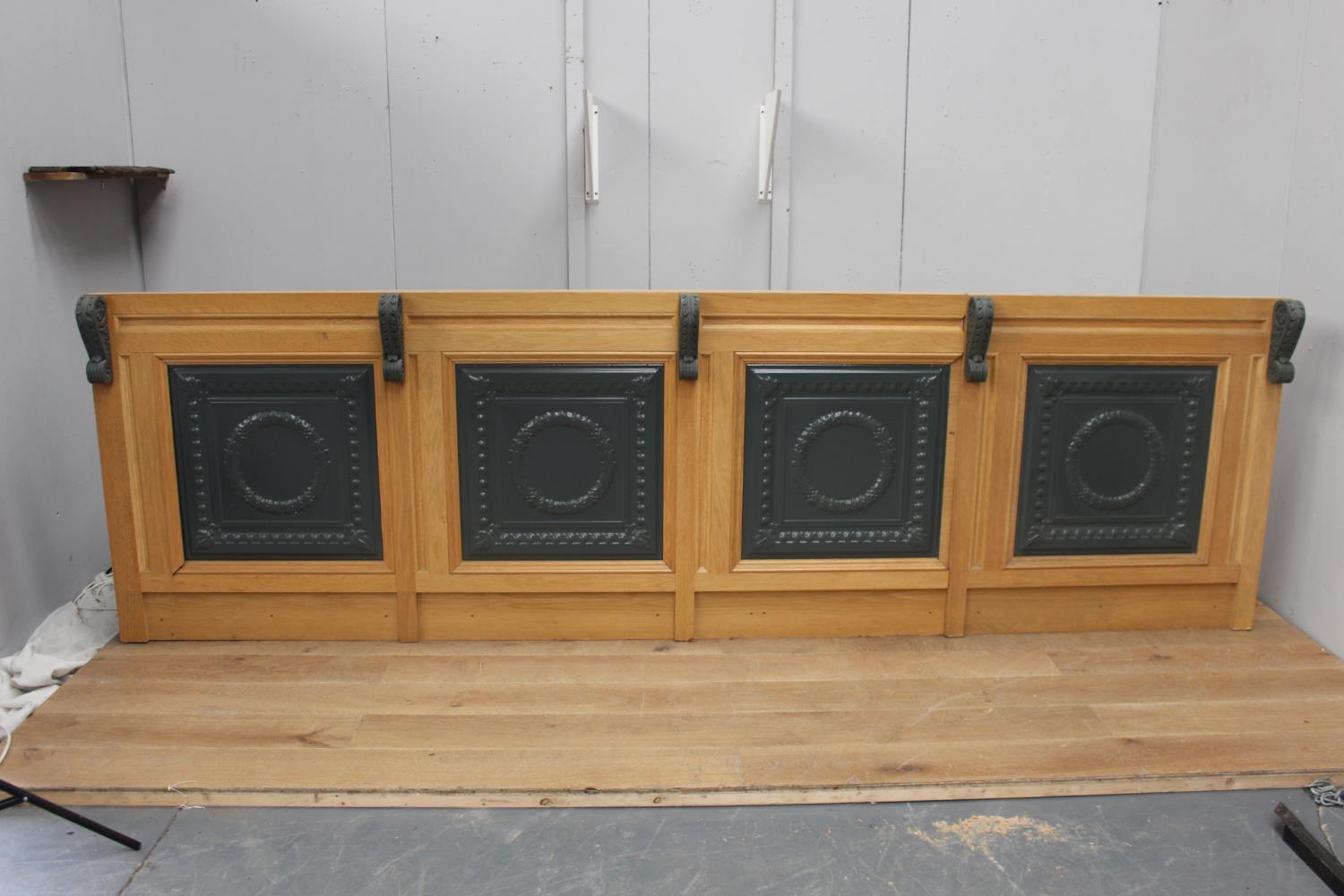 Bar front panelling with decorative aluminium panels {103 cm H x 344 cm W x 74 cm D}.