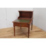 Mahogany side table with green leather inset top and single drawer raised on turned legs {60 cm H