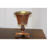 Walnut veneered ice bucket with brass insert {53 cm H x 40 cm Dia.}.