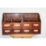 Set of eight chemist drawers with original labels {67 cm H x 113 cm W x 40 cm D}.