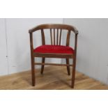 Oak slat back armchair with red velvet upholstered seat {80 cm H x 57 cm W x 44 cm D