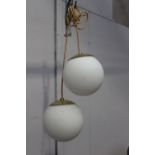Pair of brass and white milk glass hanging lights {Drop 98 cm H and Shade 30 cm H x 38 cm Dia.}.