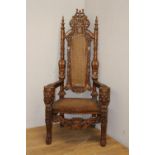 Decorative carved mahogany throne chair with lions masks and rattan seat and back {180 cm H x 92