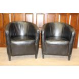 Pair of black leather tub chairs {78 cm H x 70 cm W x 47 cm D}.