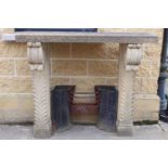 Sandstone chimney piece with scroll and corbel design {120 cm H x 140 cm W x 45 cm D}