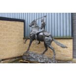 Large Bronze model of Horse with Indian rider on craggy rock. {300 cm H x 290 cm W x 103 cm D}.