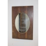 Oak wall mirror with oval plate {93 cm H x 61 cm W}.