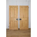 Set of two pine internal doors with brass and black knobs {1978 cm H x 76 cm W}