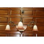 Polished metal four branch chandelier with tulip shades {80 cm H x 90 cm Dia.}.