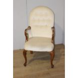 Mahogany and upholstered armchair in the Queen Ann style {114 cm H x 57 cm W x 50 cm D}.
