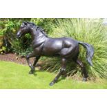 Bronze model of a trotting horse { 152cm H X 180cm L X 79cm D }.
