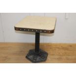 Cast iron studded table with metal top {75 cm H x 60 cm W x 70 cm D}.