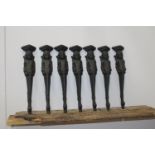Set of seven cast iron legs {38 cm H x 8 cm W x 40 cm D}