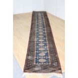 Persian design carpet runner { 390cm L X 65cm W }.