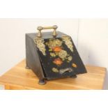 Metal and brass coal scuttle decorated with flowers {37 cm H x 29 cm W x 40 cm D}.